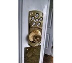 Electronic_Deadbolt_Lock_On_The_Front_Of_The_Door.jpg