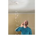 man_looking_at_wet_ceiling.jpg